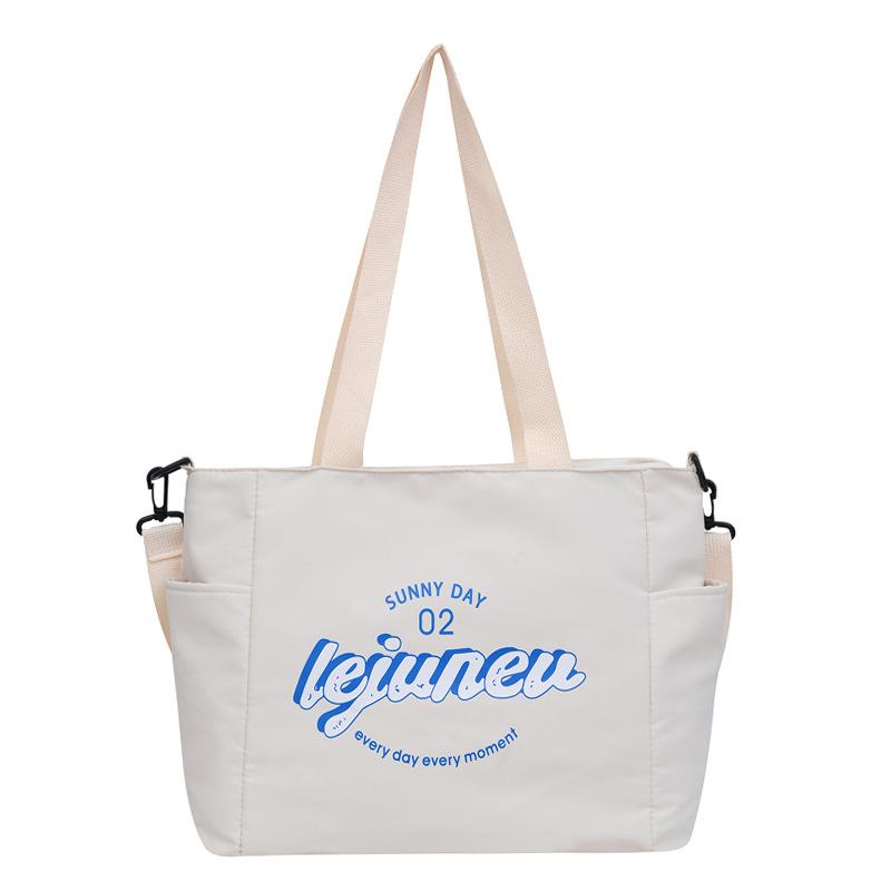 

2025 новая сумка с надписью, нейлоновая сумка, женская сумка-тоут большой вместимости, простая студенческая на плечо бежевый