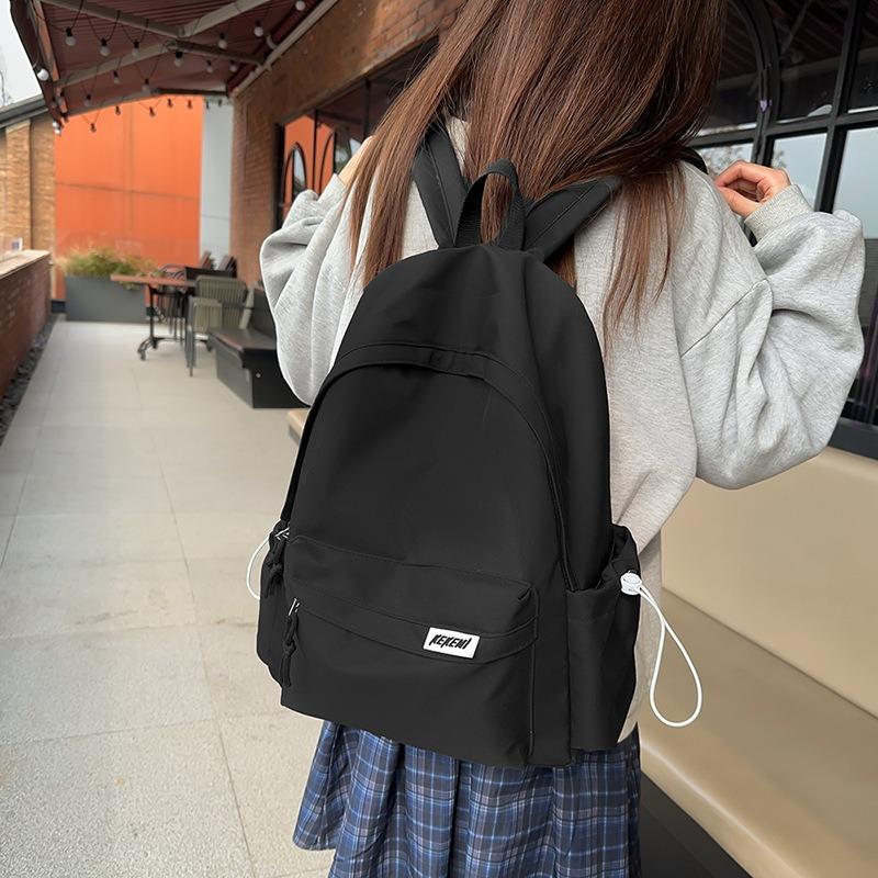 Simple casual large-capacity backpack women's new junior high school high school student schoolbag versatile travel backpack