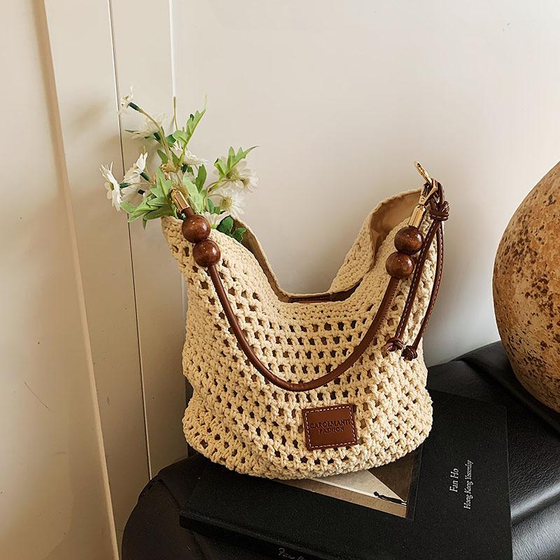 

Женская сумка-тоут 2025 новая большая вместимость студенты колледжа класс плетение мягкая полая пляжная сумка через плечо