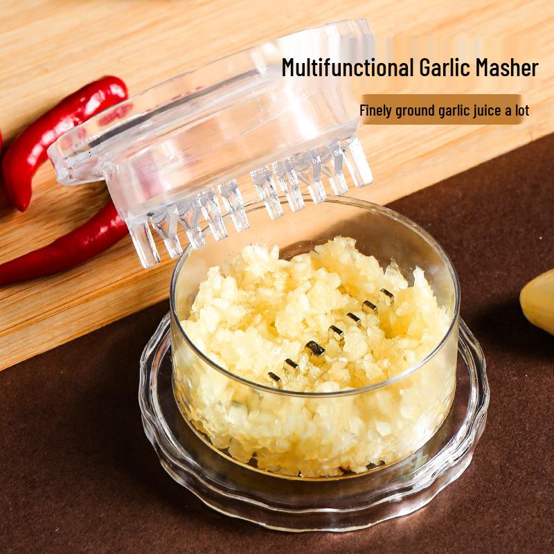 Lis na česnek a kráječ: Ruční mlýnek na zázvor a česnek, kuchyňský gadget a výrobník pasty.