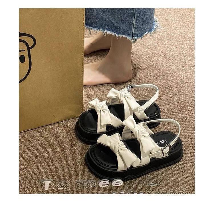 Korean Sle Women's Sandals 2025 Summer New Thi Bot Cross Tie Roman Beach Fairy oes Sweet Low Heel Flat Bot Rubber...