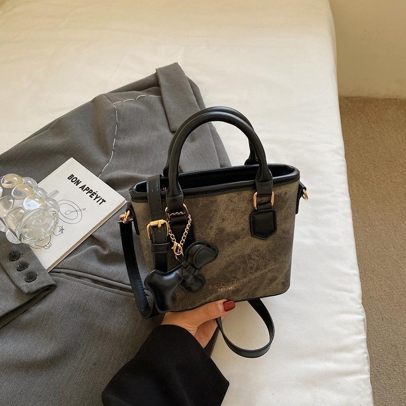 Textur trendige Nischentasche Herbst neu retro Schulter Umhängetasche Mode tragbare Eimertasche Damen