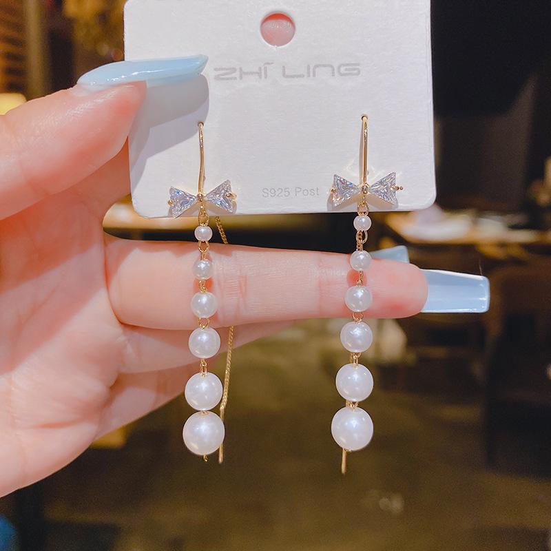 Fashion and elegance, atmospheric bow pearl earrings, women's design sense, versatile, exquisite stud earrings, sweet temperament, ear jewelry