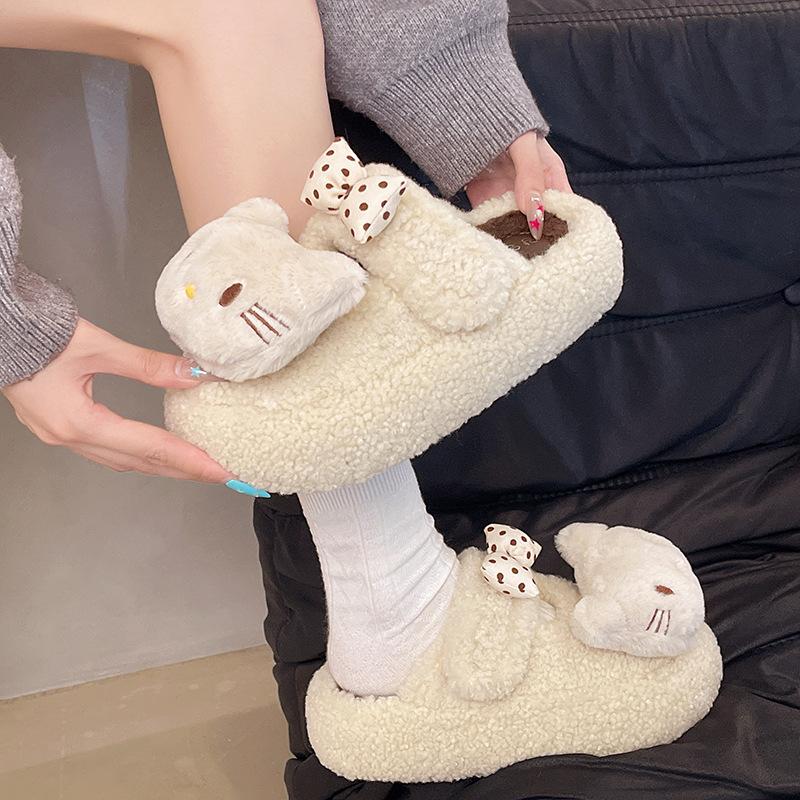 Niedliche Cartoon einfarbige Schleife mit Herzchen kt Katze flauschige Hausschuhe Damen 2025 Herbst und Winter neue Baumwoll-Hausschuhe für draußen