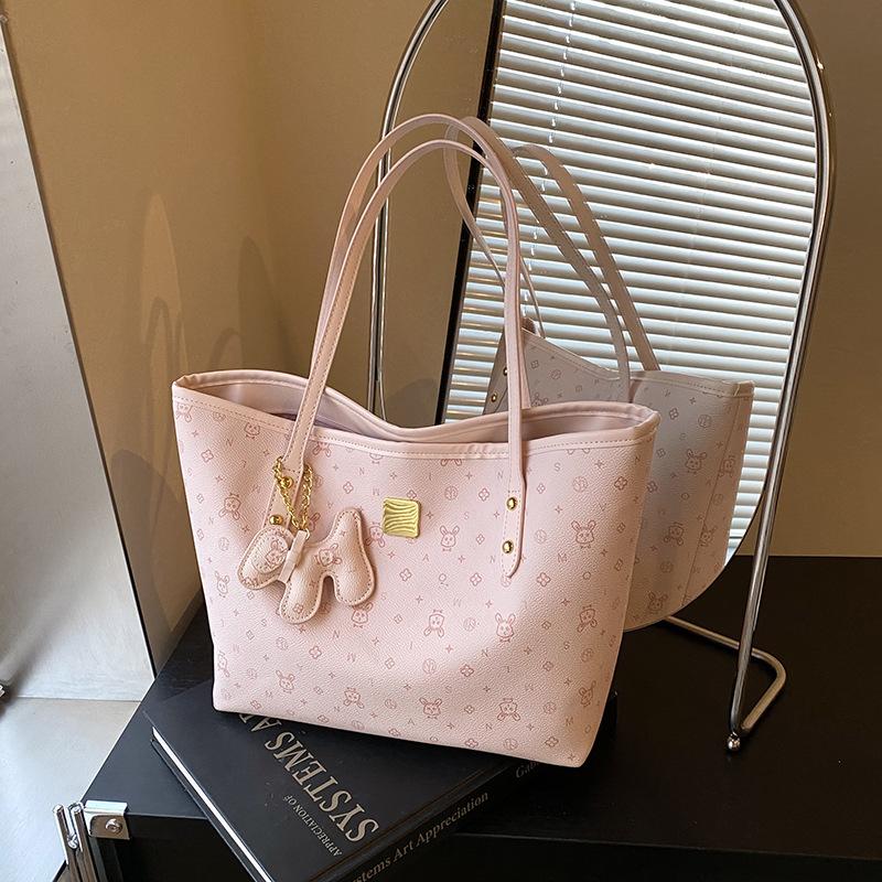 Niche casual shoulder bag women's new high-end sense large capacity simple fashion commuter tote bag