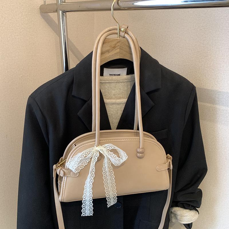 

Нишевая популярная женская сумка 2025 весна-лето новая простая и универсальная сумка через плечо текстурированная сумка-подмышка подушка 29*7.5*16