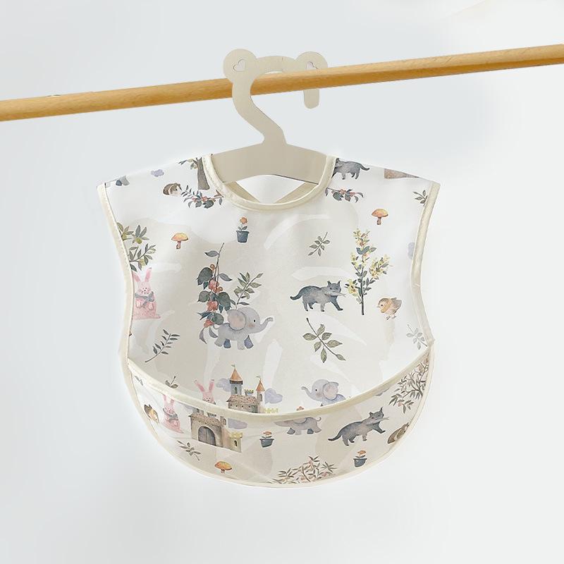 Waterproof Cotton Baby Apron: Stain-Resistant PU Reversible Bib with Pocket for Toddlers and Infants.