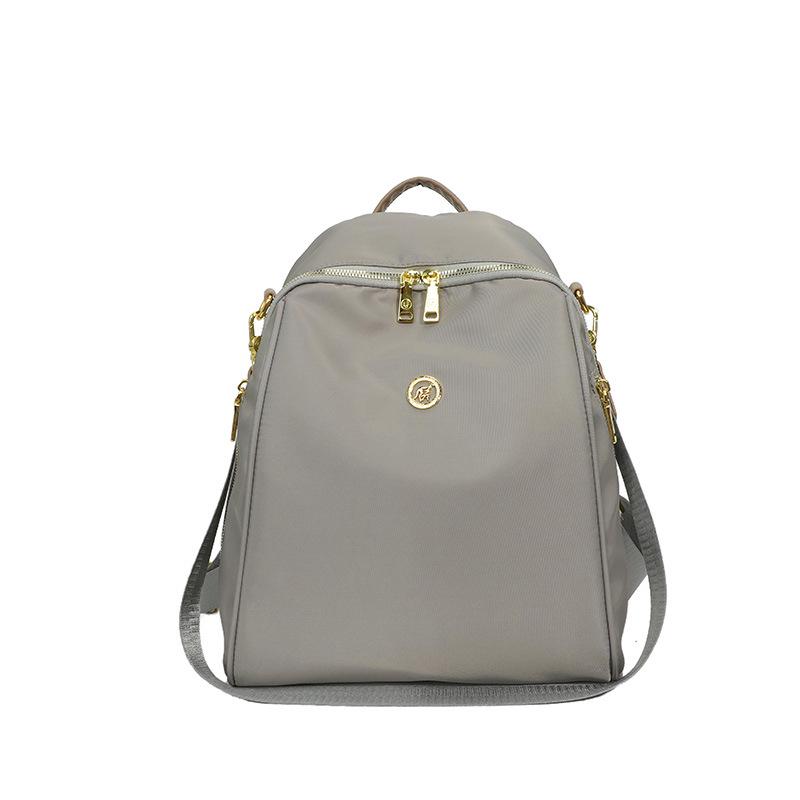 

Женский универсальный модный рюкзак - Большой, Легкий, Однотонный, Повседневный дорожный и школьный рюкзак 27*15*33 cm светло-серый