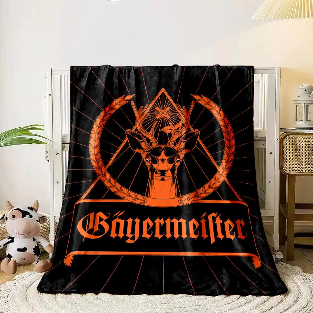 A deer with antlers inside a triangular frame, flanked by grain wreaths. for all seasons blanket lunch break throw gift 80cm x 120cm