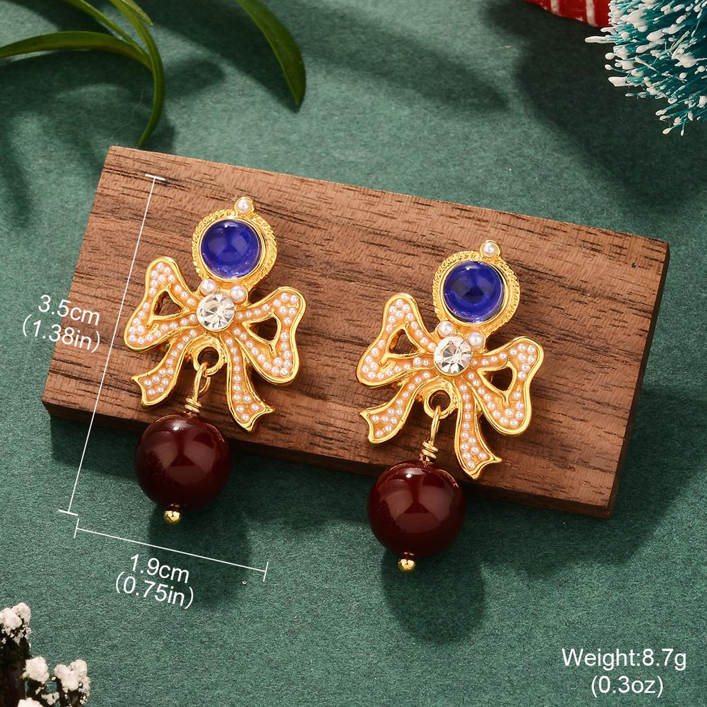 French bow New Year's pearl autumn and winter silver needle burgundy Christmas series earrings niche high-end personalized earrings