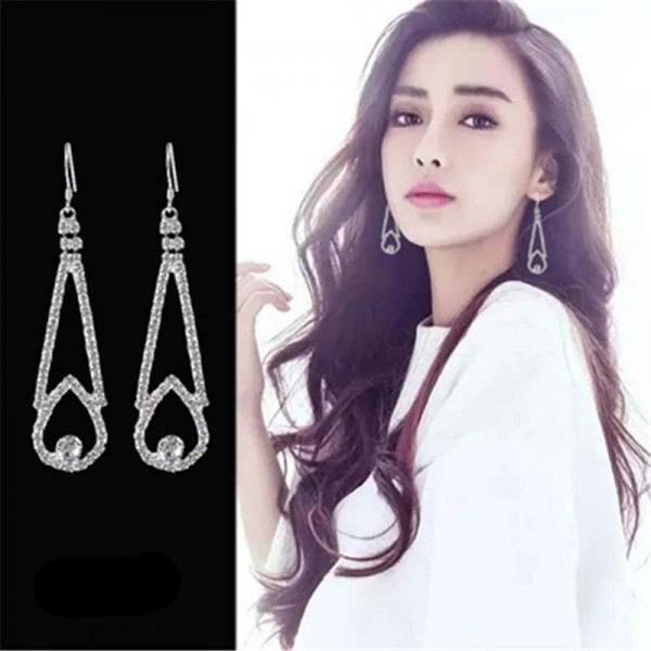 

Сережки з китицями з корейського срібла S925: Універсальний, Модний та Дизайн, що Стрункішить Обличчя