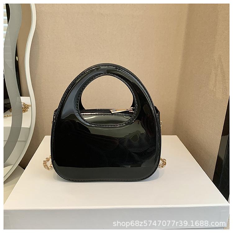 2025 new personalized glossy dinner bag women's bag fashion creative go out solid color handbag diagonal span wrist bag trendy bag