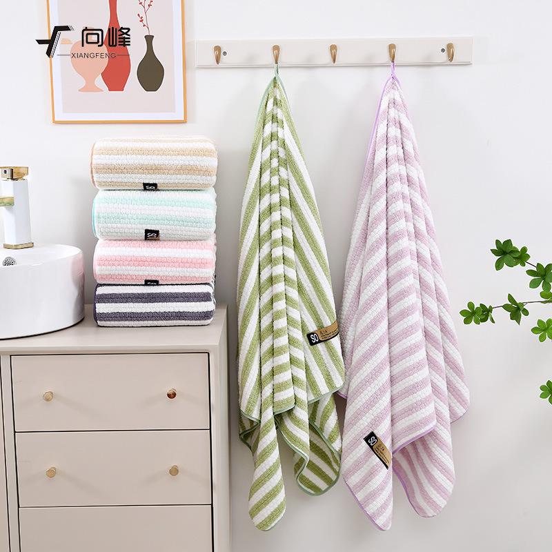 Towel New coral fleece corn kernels Yangjin bath towel Household bath soft water absorption is not easy to lose hair bath towel