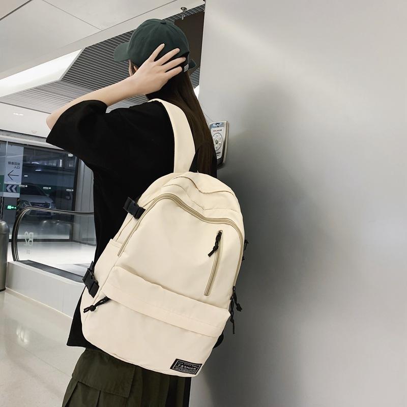 New Korean version of men's and women's large-capacity backpack, junior high school student schoolbag, casual couple college student backpack
