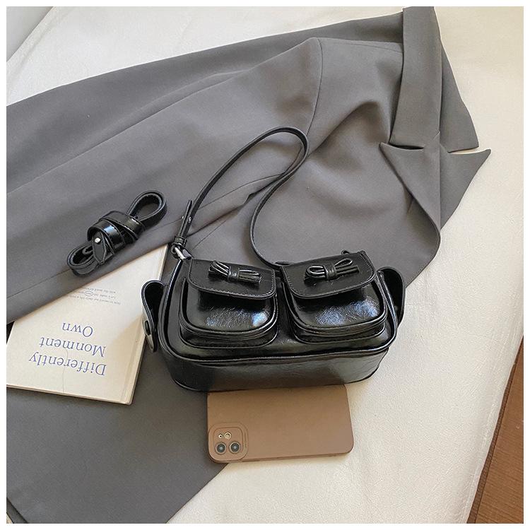 

New Hong Kong style retro armpit bag women s urban simple handbag foreign fashion commuter shoulder bag naked bag чёрный