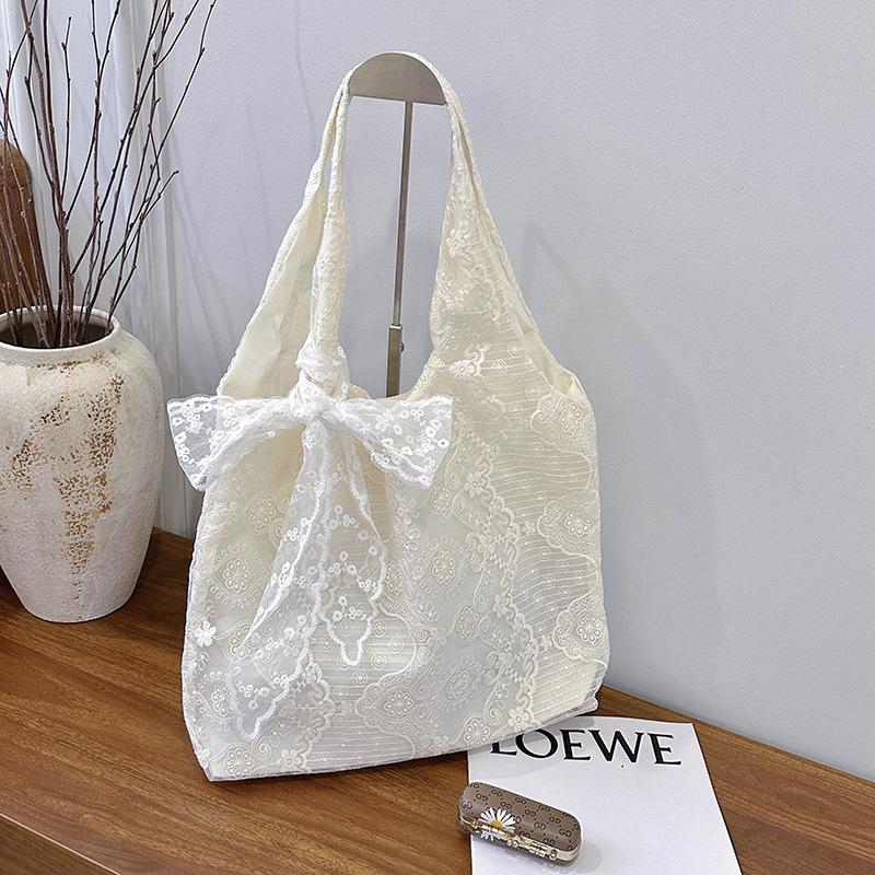 

Small fresh lace bow bag women s new large-capacity shoulder support bag commuter armpit bag