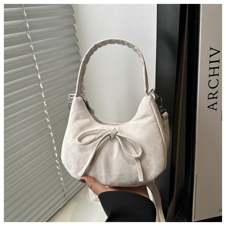 Niche handbag women's 2025 new fashionable versatile shoulder underarm bag, foreign style super fire messenger crescent bag