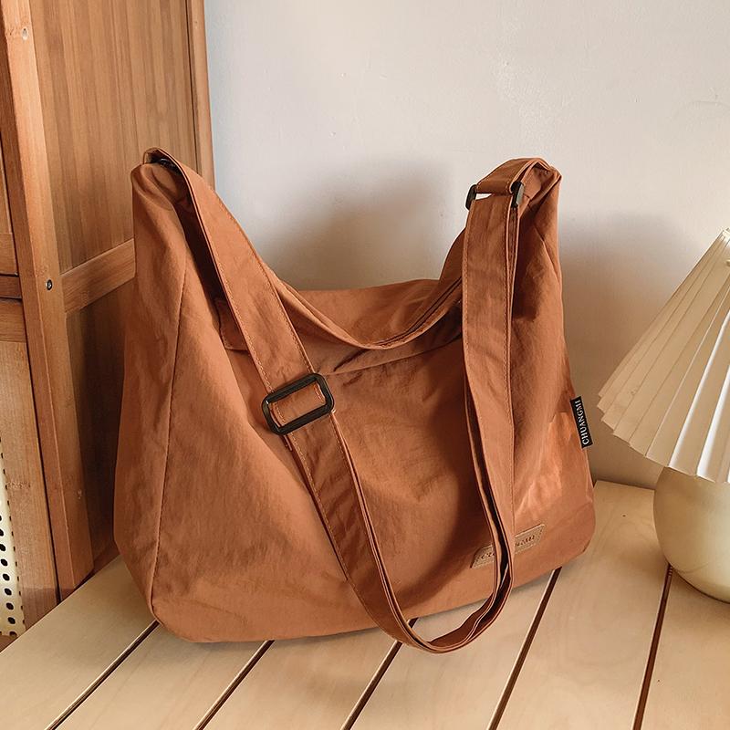 Large Capacity Nylon Crossbody Bag for Men and Women Travel Campus and Office