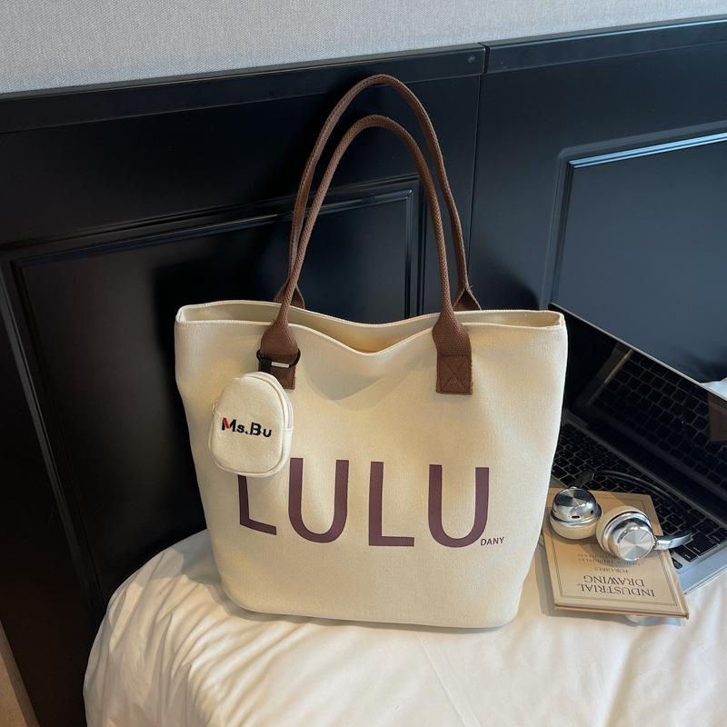 

Женская сумка 2025 лето новая холщовая сумка через плечо для通勤 большая вместимость сумка-тоут сумка из ткани с надписью ручная сумка сумка через плечо No pendant темно-коричневого