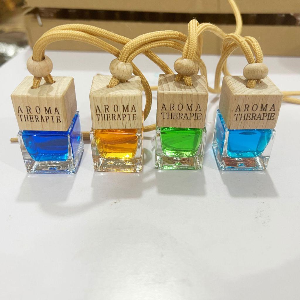 Aromatherapy Flameless Car Diffuser – Orange Scent, Essential Oil Perfume Bottle Pendant