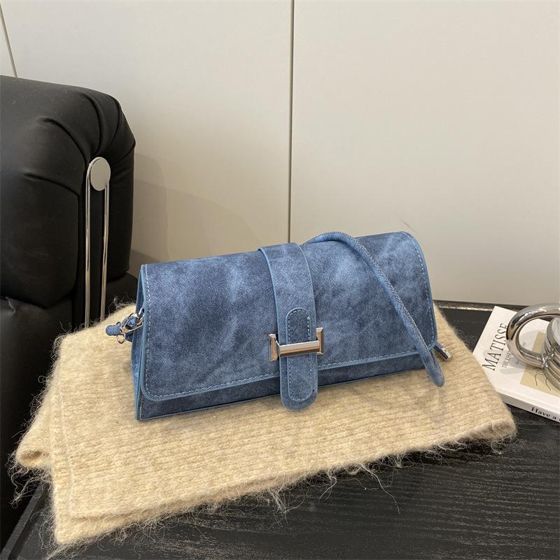 

French niche design bag women s 2025 new popular versatile belt high-end feeling single shoulder underarm baguette satchel синий