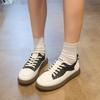 Imitation leather retro little white shoes women's 2025 spring and autumn models, one-pedal soft-soled comfortable and versatile casual sports shoes