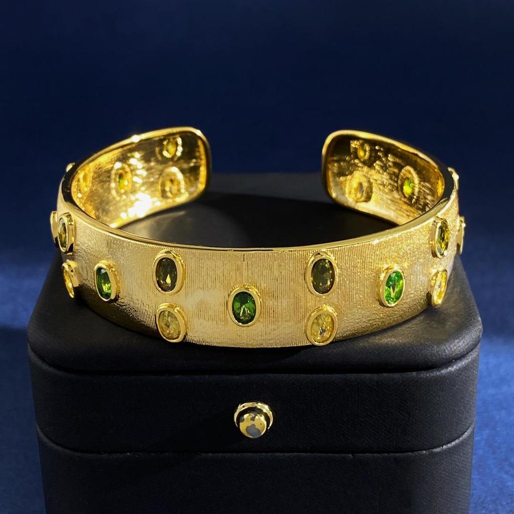 Brushed Gold-Plated C-Shaped Bracelet with Oval Gem