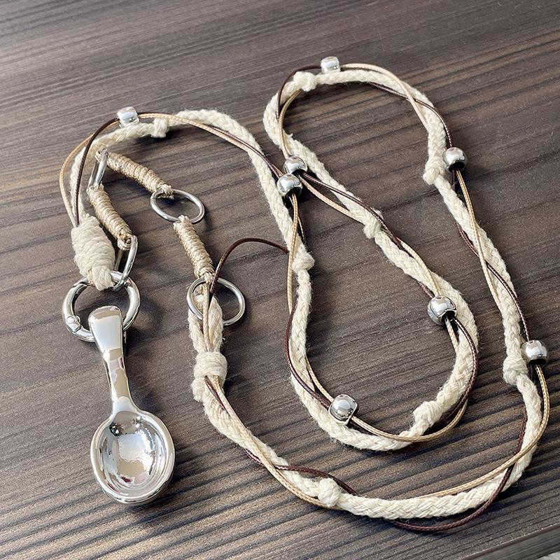 

Ожерелье-подвеска в виде серебряной ложки ручной работы: Плетеная цепочка для свитера с уникальным дизайном