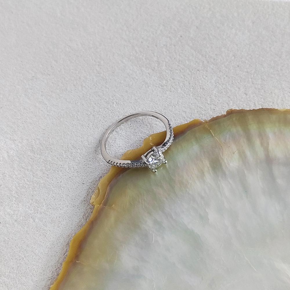 S925 Sterling Silver 50-Point Twisted Moissanite Ring with Four-Prong Setting