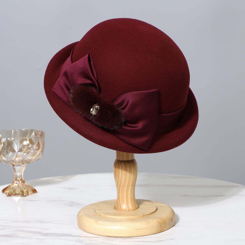 Berretto in lana con fiocco di visone elegante francese da donna autunno inverno cappello a secchiello arricciato di alta gamma cappello a cilindro di temperamento