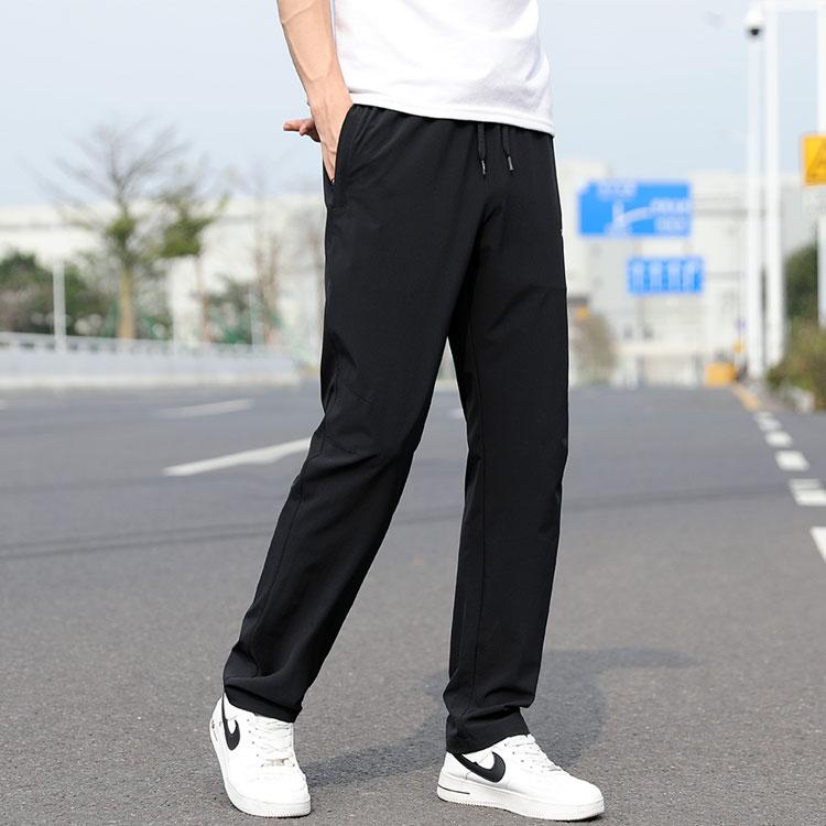 Li Ning Football Series Solid Color Ice Silk Lightweight Breathable Stretch Knitted Sports Pants Men Pants Black AYKS473-1