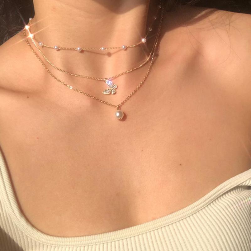 

Европейская и американская мода, многослойное жемчужное ожерелье с подвеской в ​​виде бабочки и бриллиантов для женщин, ожерелье в стиле Instagram