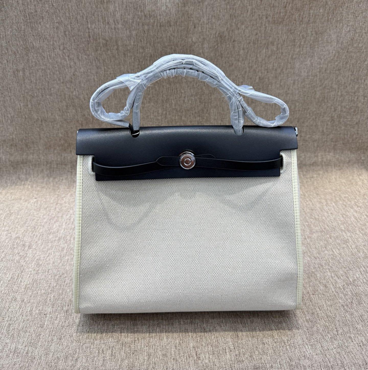 

Новий продукт Наплічна сумка Herbag з коров ячої шкіри з відповідною китицею* Багатофункціональна Універсальна Практична Сумка через плече на одному шкіряному ремені Подвійна шкіряна сумка 31x11x26cm білий