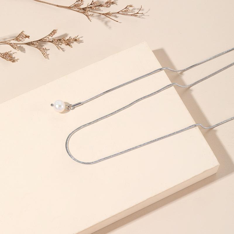 

Элегантное многослойное жемчужное ожерелье в стиле легкой роскоши: Универсальный, простой стиль, невыцветающая титановая сталь для женщин