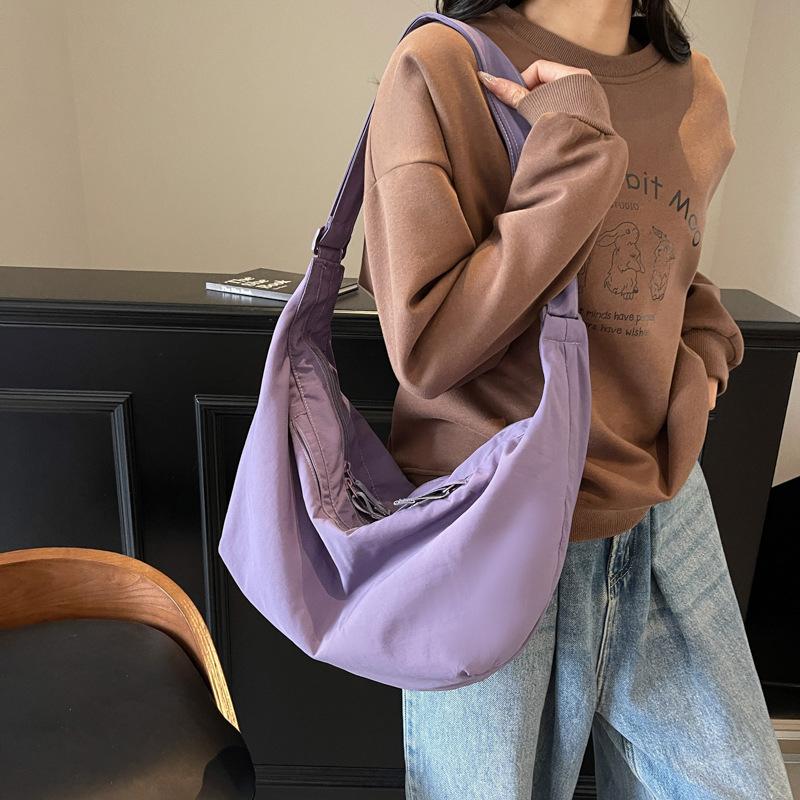 Spring new niche dumpling literary satchel ins wind Japanese Korean mailman women's shoulder messenger bag