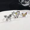 Unregelmäßiger offener Schmetterlingsring, Nischen-Designgefühl, Verstellbarer Zeigefingerring, Stapelbar, Tragen eines hochwertigen Rings