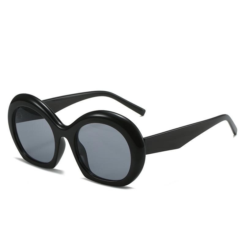 New oval sunglasses, European and American personalized arc inflatable glasses, street puff sunglasses for women