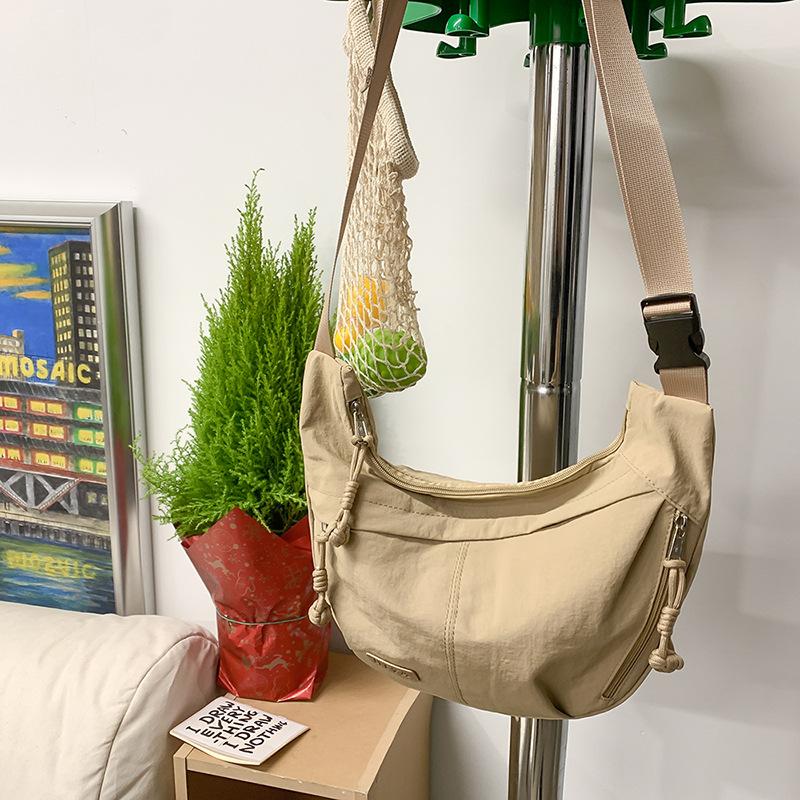

Large Capacity Messenger Bag Female Junior High School Student High School Solid Color Small Fresh Dumpling Bag College Student Casual Shoulder хаки
