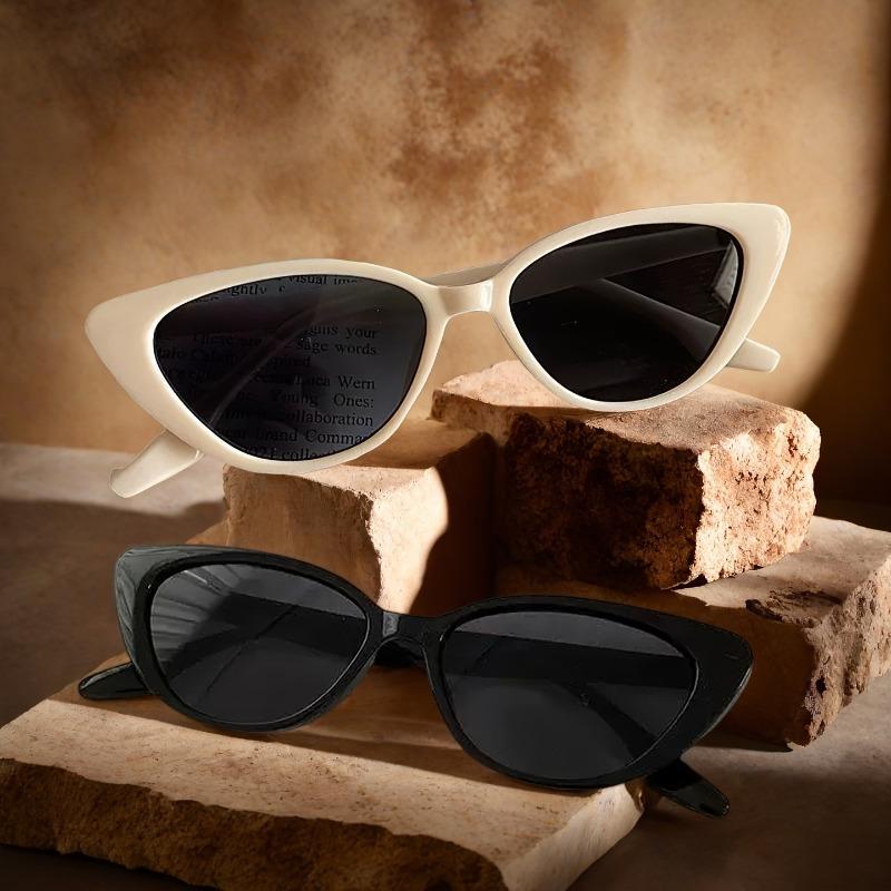 2 pairs cat eye style black and milky white. Vintage and versatile the perfect gift for family and friends