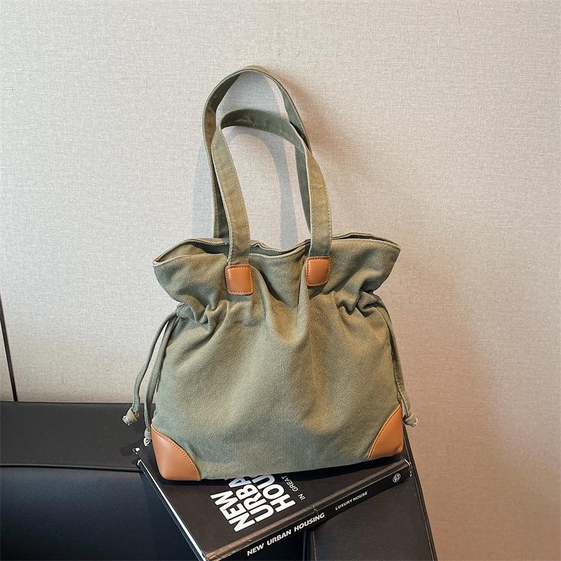 Casual Lazy Wind Simple Capacity Canvas Bag Women 2025 New Simple Korean Version Versatile Shoulder Bucket Bag