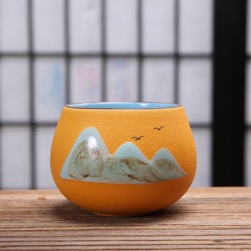 Hand-Painted Black Pottery Zen Tea Cup - Retro Mountain Design, Kung Fu Ceramic Masterpiece for Tea Tasting and Guest Reception.