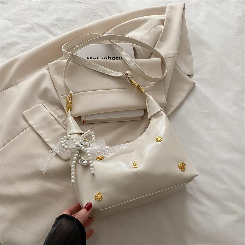 Super fire small bag women 2025 new foreign versatile messenger bag popular this year Korean women's dumpling bag