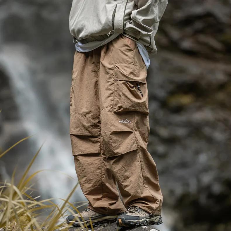 Men's Spring Mountaineering Waterproof Rushing Pants Youth Handsome Loose Sports Work Pants