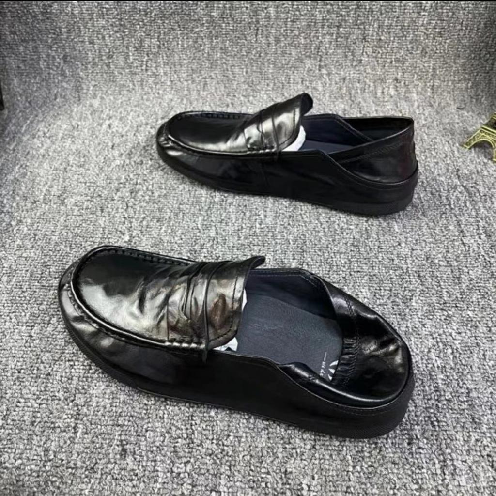 2025 spring men's one-pedal leather hollow breathable casual Doudou shoes Korean version versatile low-top men's shoes leather shoes