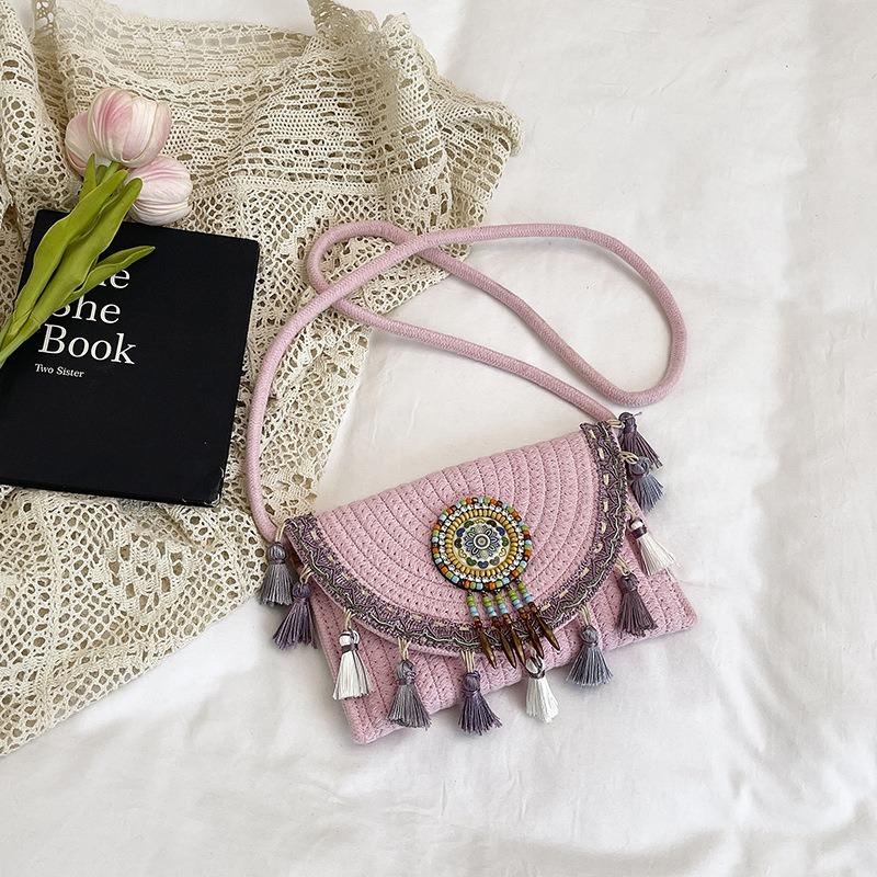 National beach woven bag women's summer new contrasting color fringed straw woven casual shoulder messenger bag