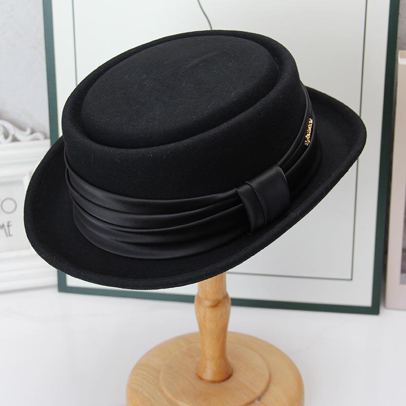 New warped edge wool top hat British retro autumn and winter jazz hat European and American women's short brim fashion versatile hat