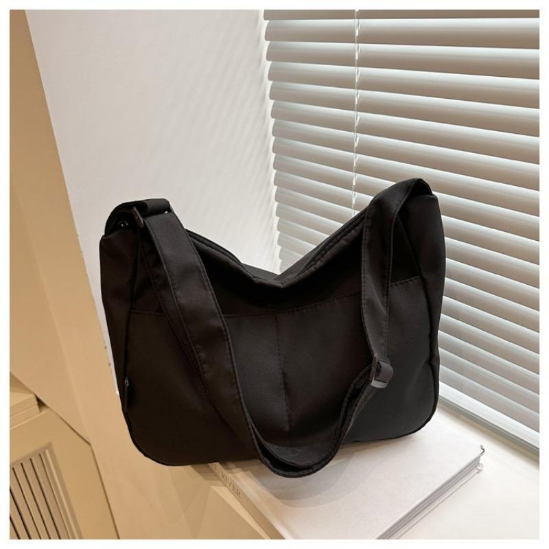 New casual messenger canvas bag, simple large-capacity shoulder bag, niche design sense, daily commuter bag