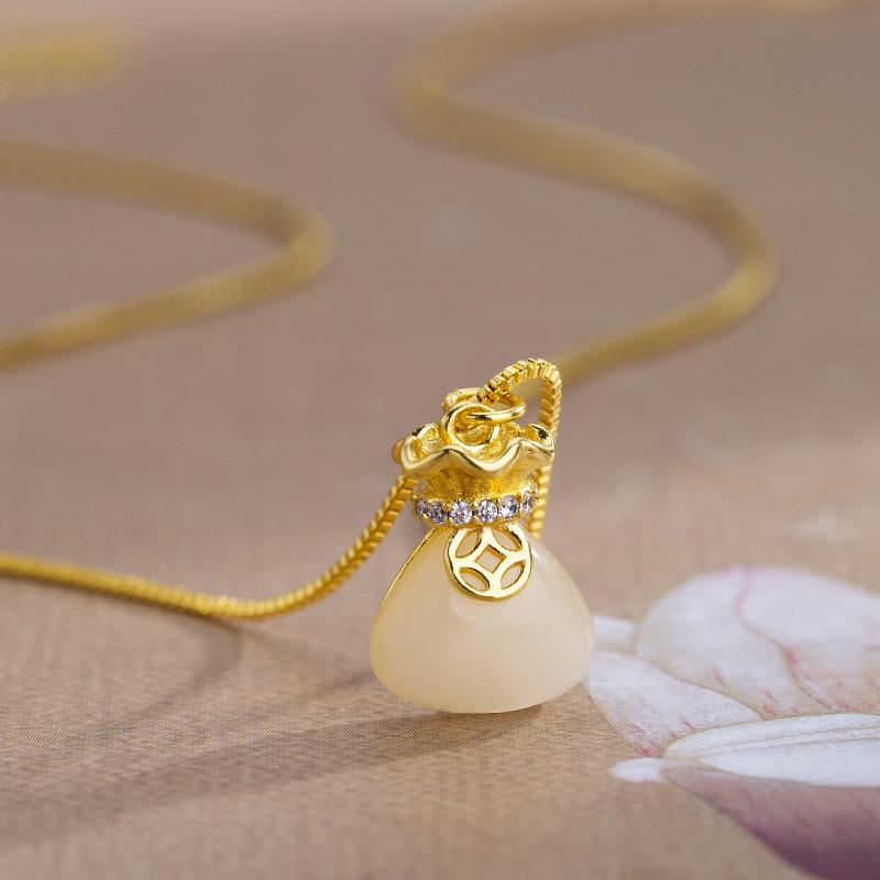 Retro Women's Luxury White Jade Pendant Necklace with High-End Design