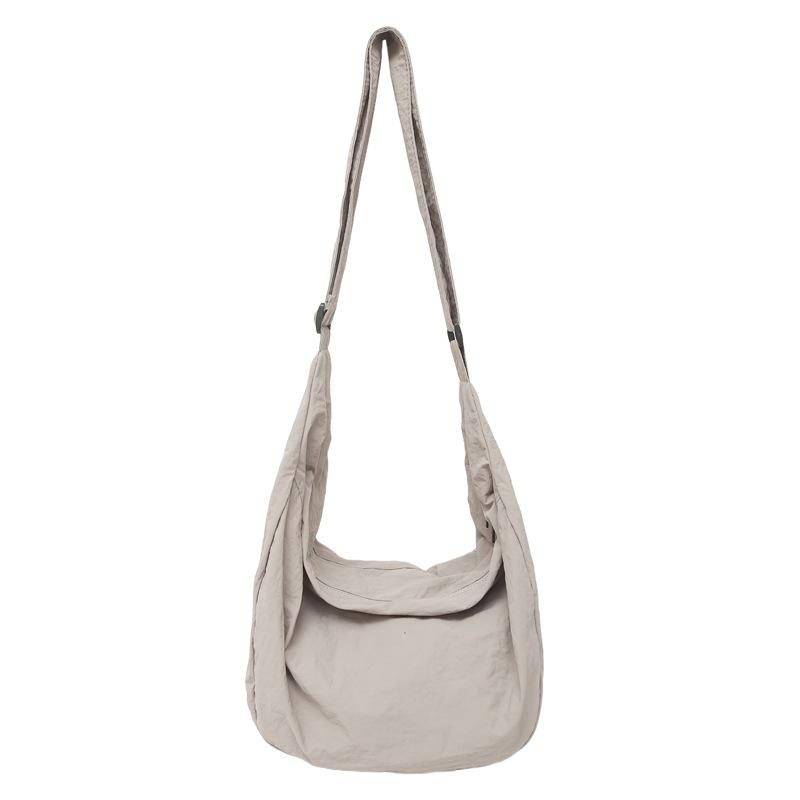 Lazy wind canvas bag new simple dumpling bag versatile women's shoulder bag large capacity commuter messenger bag