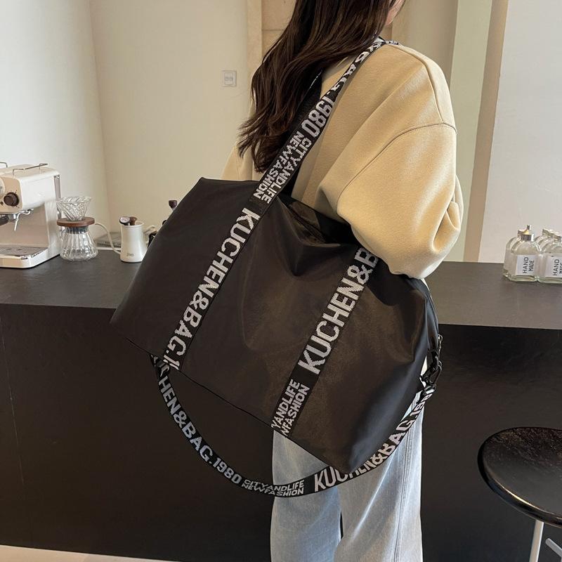 Men's and women's same fashion trend anti-splashing portable travel bag, simple and lightweight fitness bag, student school luggage bag